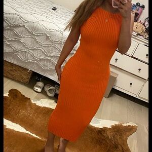 Orange midi dress. It’s brand new super stretchy